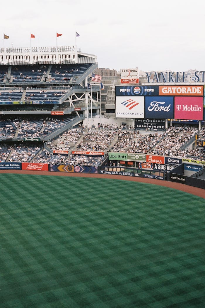 story-02 Aerial view of Yankee Stadium during a baseball game, showcasing vibrant green field and spectators.